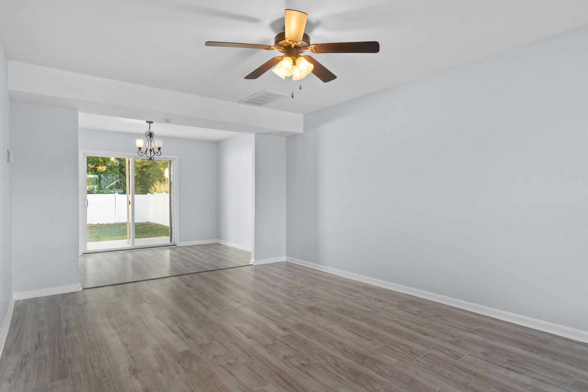 3815 Harvest Ridge Clarksville, TN 37040 - Photo 4 of 24 wooden floor in an empty room with a window