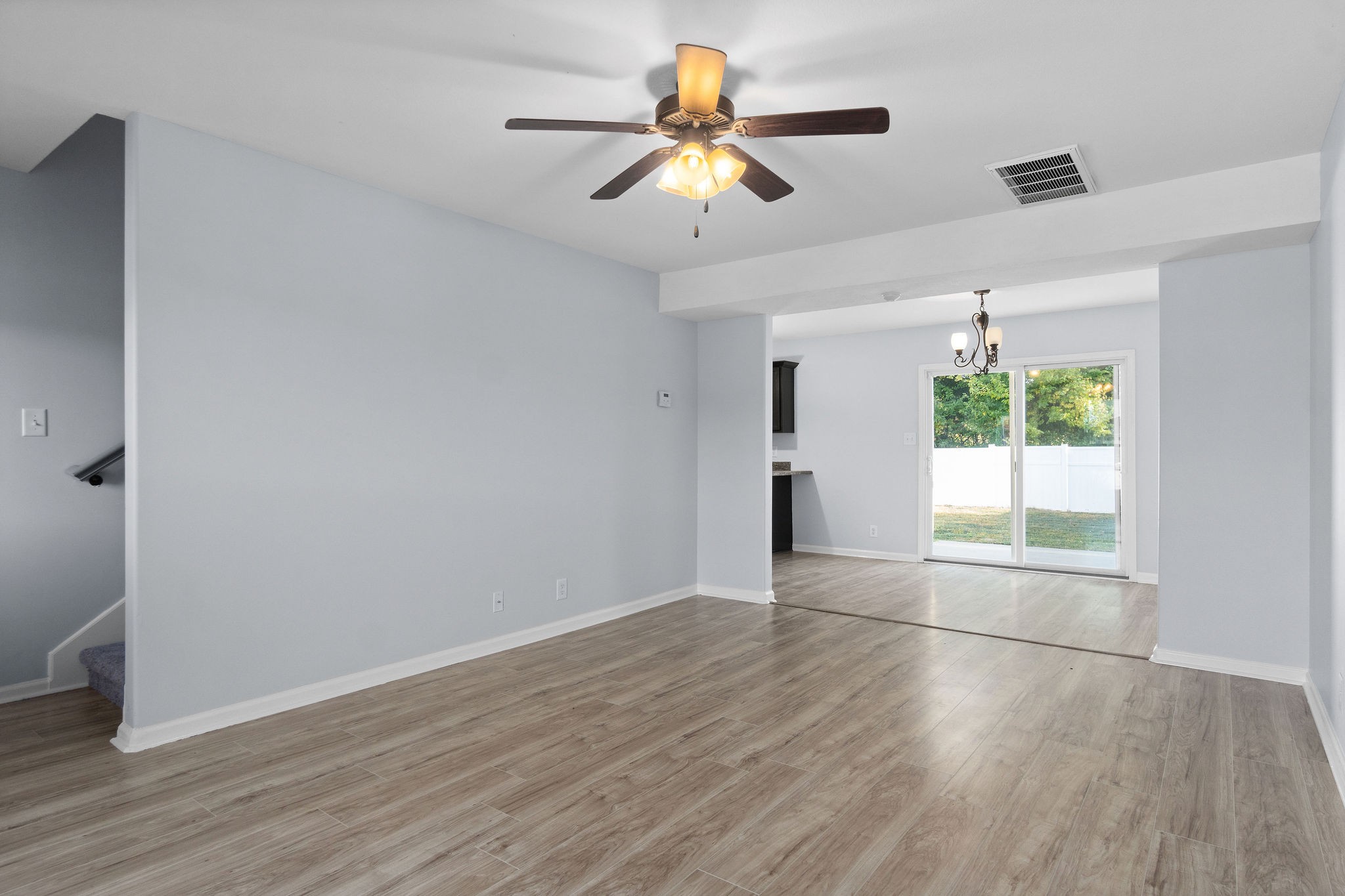 3815 Harvest Ridge Clarksville, TN 37040 - Photo 5 of 24 wooden floor in an empty room with a window