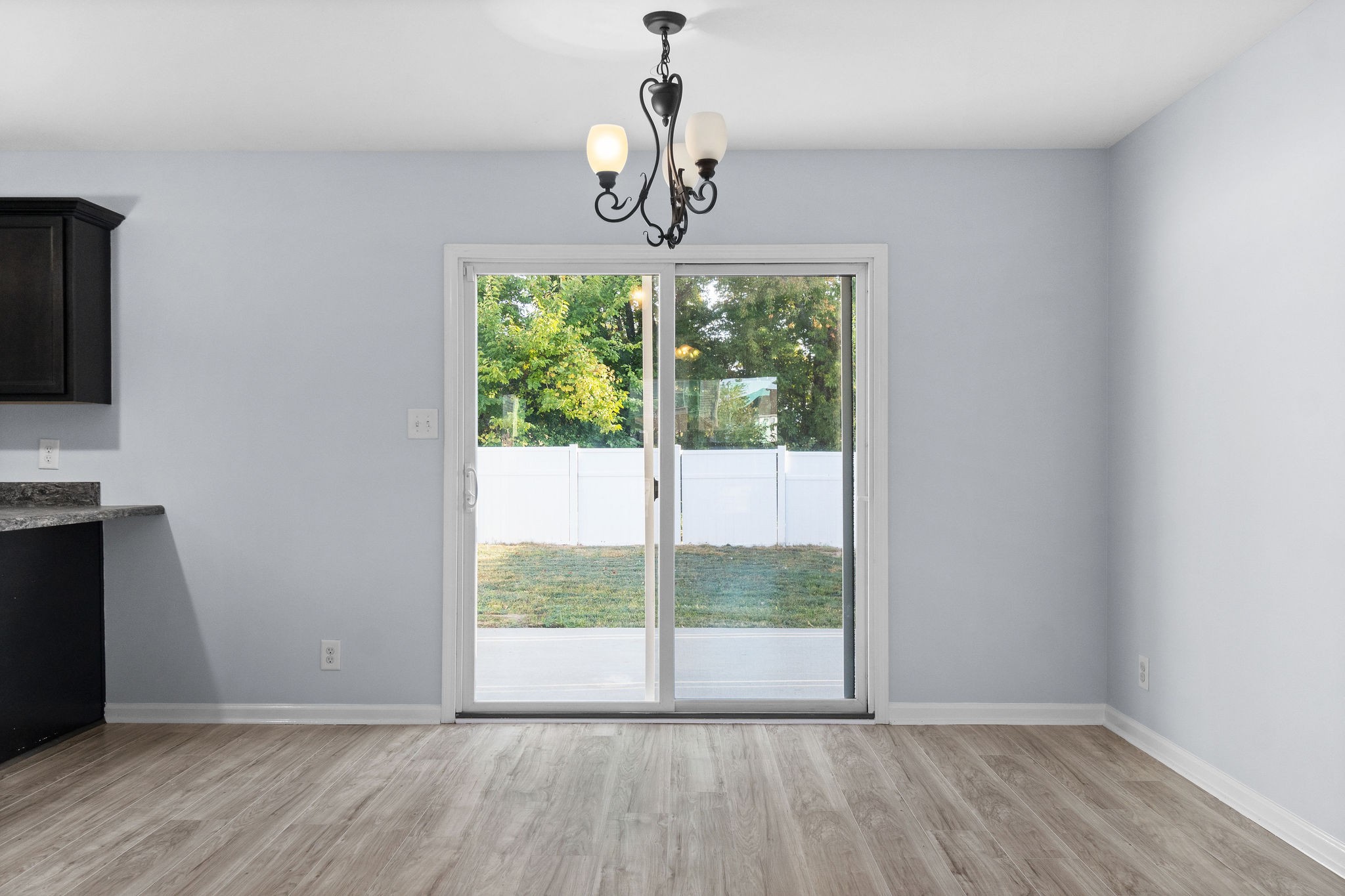 3815 Harvest Ridge Clarksville, TN 37040 - Photo 7 of 24 a view of an empty room with wooden floor and a window