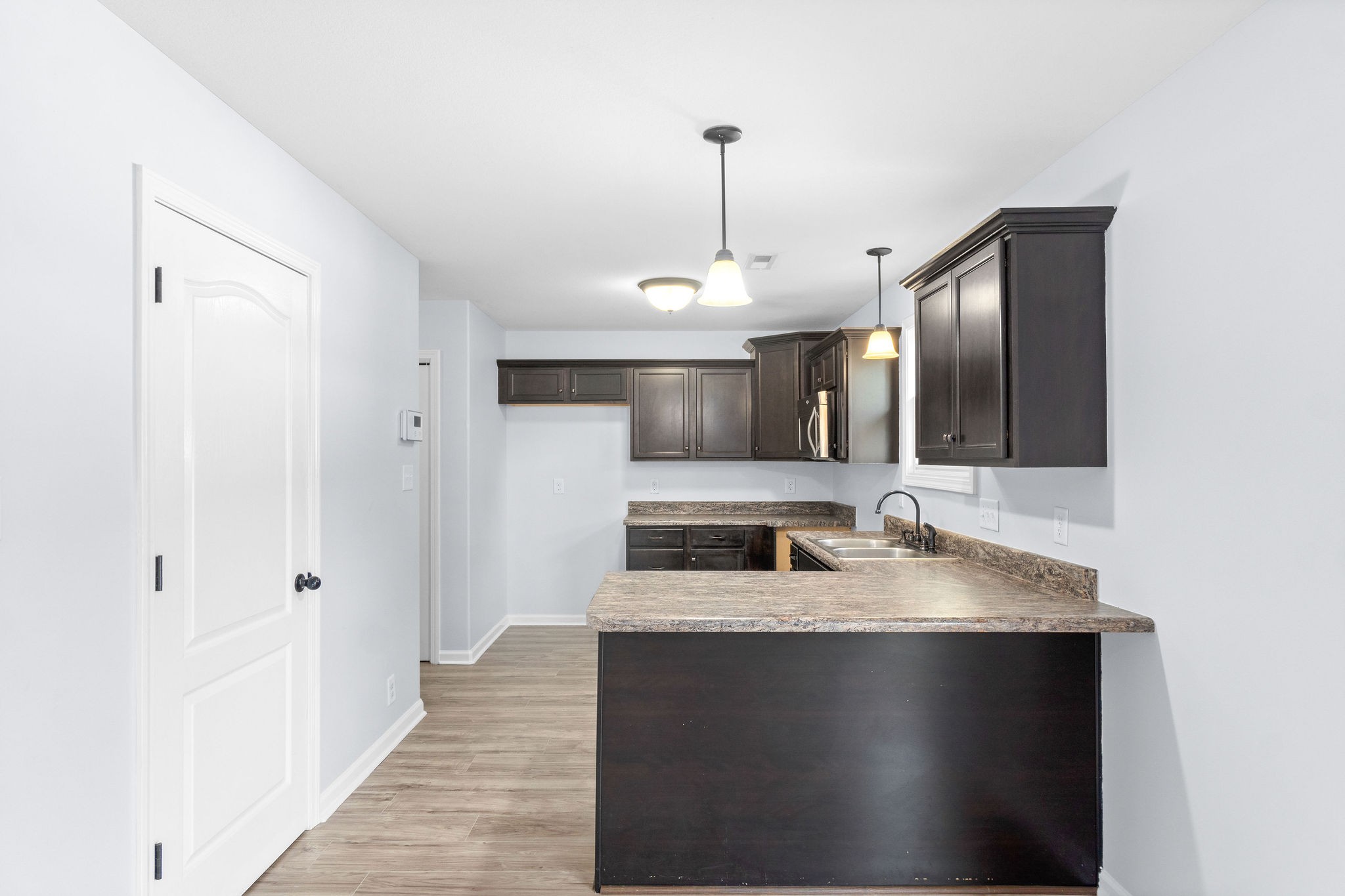 3815 Harvest Ridge Clarksville, TN 37040 - Photo 8 of 24 a view of a kitchen from the hallway
