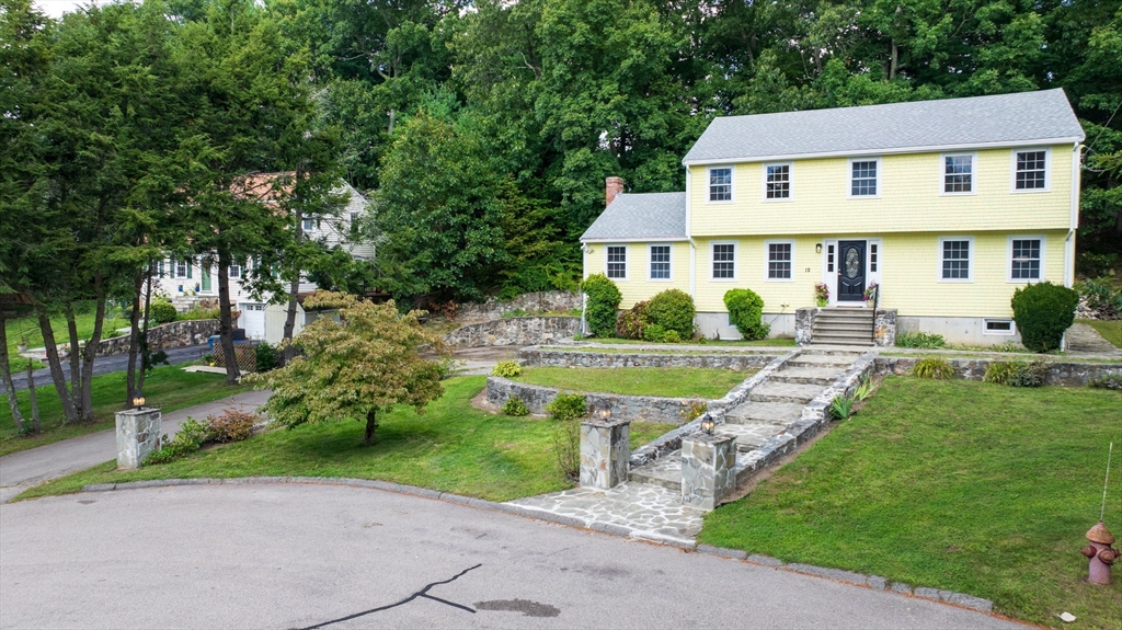 a house with garden in front of it