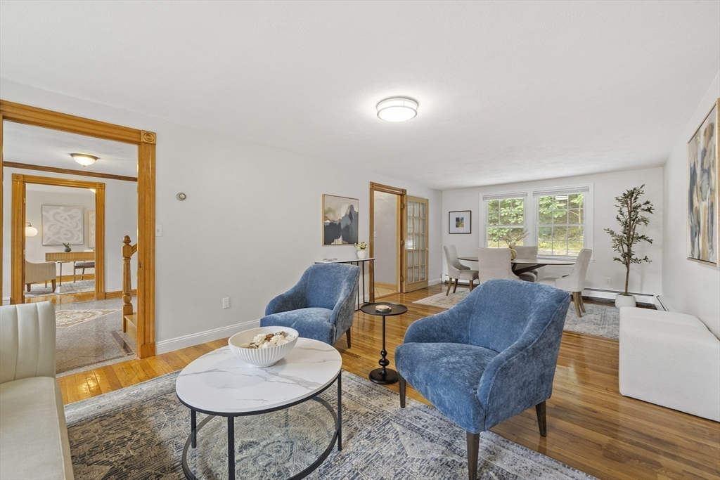 12 Colonial Lane Canton, MA 02021 - Photo 11 of 42 a living room with furniture and wooden floor
