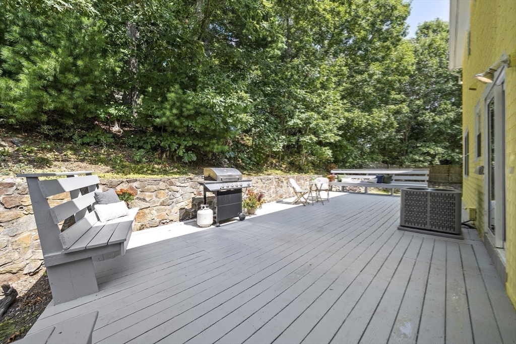 12 Colonial Lane Canton, MA 02021 - Photo 36 of 42 a view of a chairs and table on the wooden floor