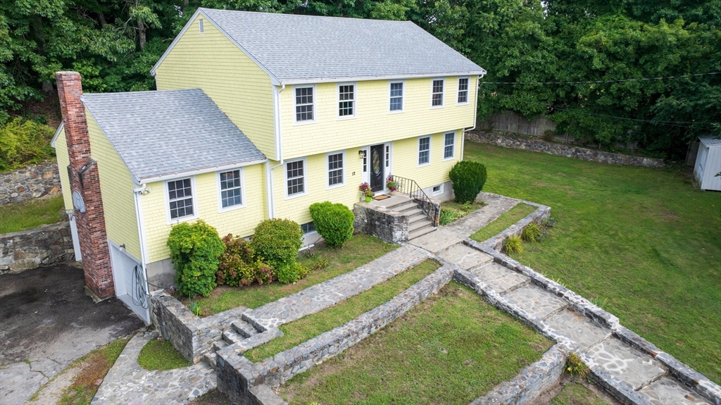 12 Colonial Lane Canton, MA 02021 - Photo 41 of 42 a aerial view of a house with garden