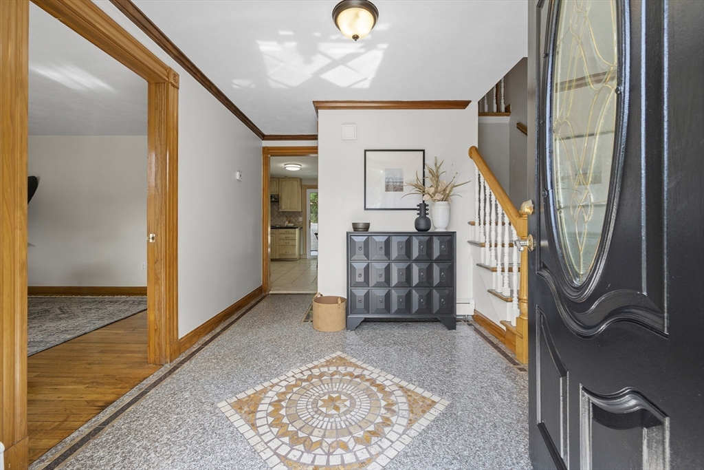 12 Colonial Lane Canton, MA 02021 - Photo 5 of 42 a view of an entryway with wooden floor