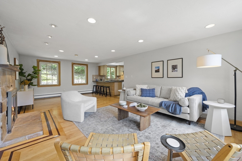 12 Colonial Lane Canton, MA 02021 - Photo 6 of 42 a living room with furniture and a table
