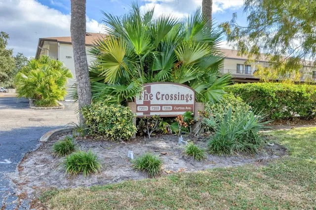 a view of a building with a yard