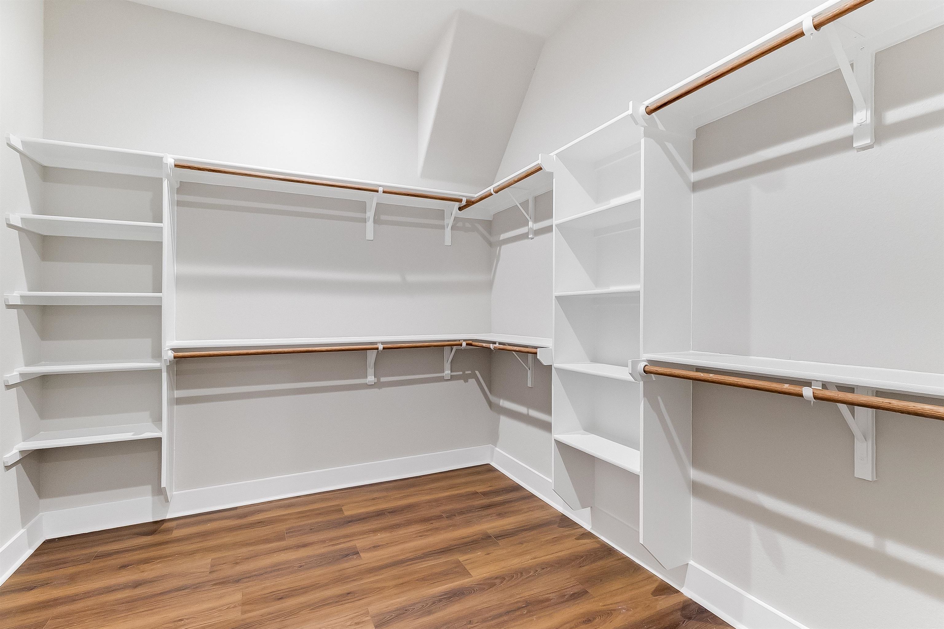 118 Rosebud Rnch Road Bertram, TX 78605 - Photo 11 of 23 a view of walk in closet with empty racks