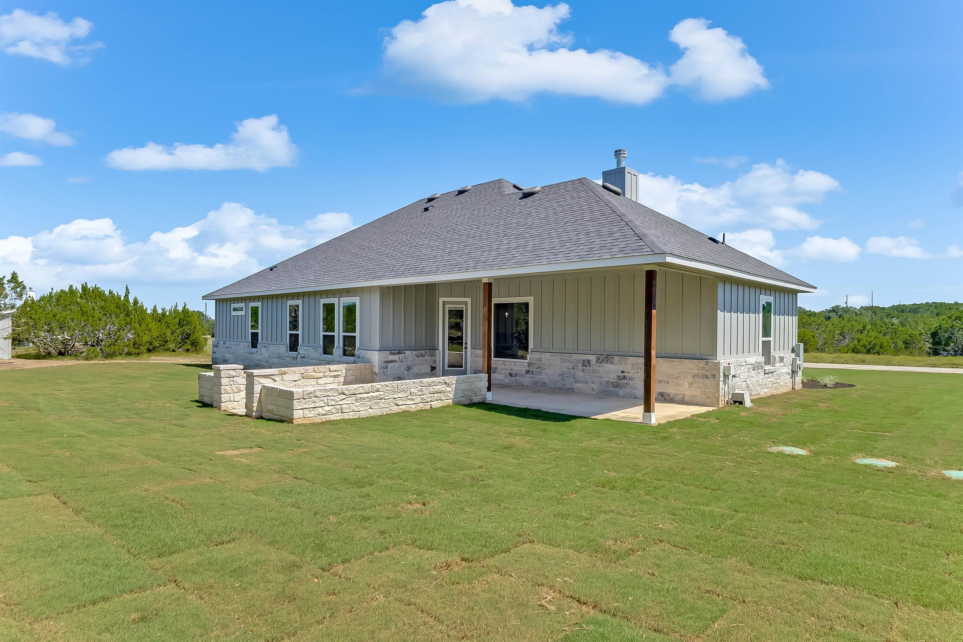 118 Rosebud Rnch Road Bertram, TX 78605 - Photo 21 of 23 a view of a house with a yard porch and sitting area
