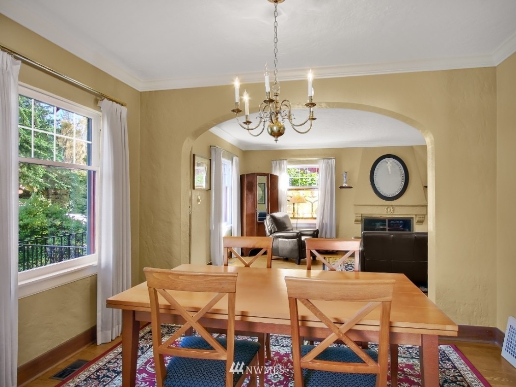 3015 West Viewmont Way West Seattle, WA 98199 - Photo 3 of 15 a view of a dining room with furniture window and outside view
