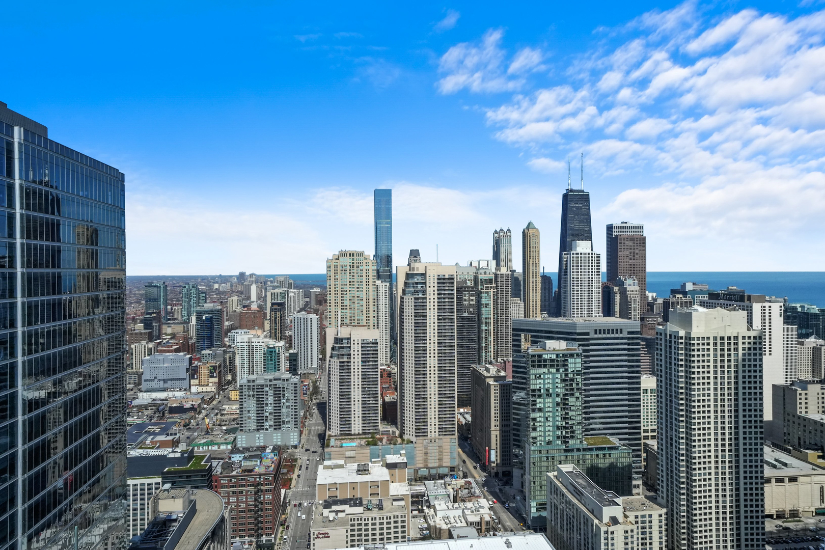 300 North State Street, Unit 5225 Chicago, IL 60654 - Photo 16 of 17 a view of a city with tall buildings