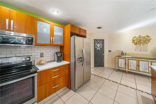 $824,000 | 14811 Archerhall Street, Davie, FL 33331