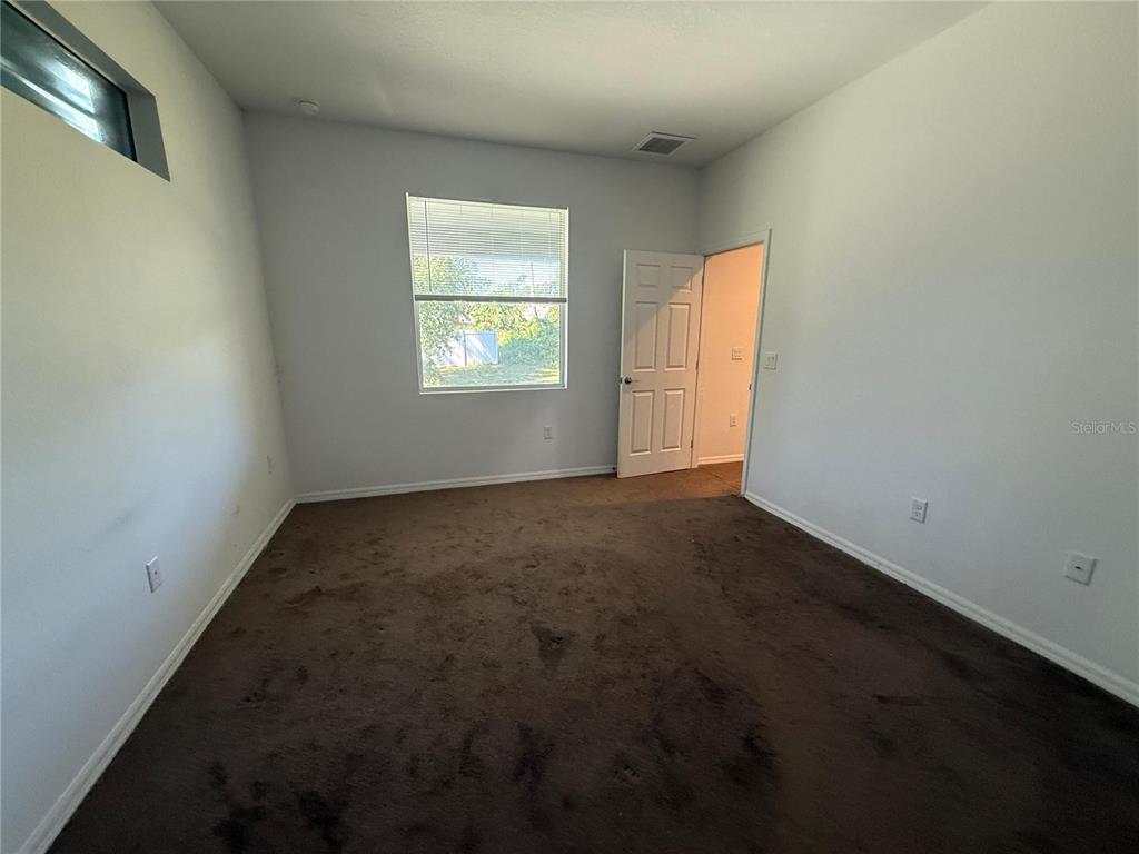 2143 Nabble Lane North Port, FL 34288 - Photo 13 of 17 an empty room with windows