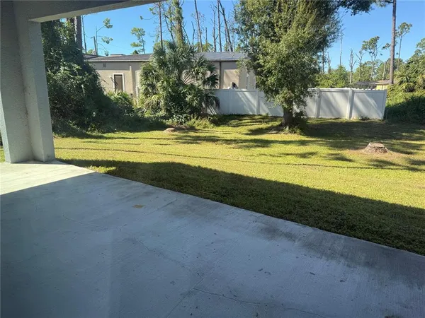 a view of a house with swimming pool