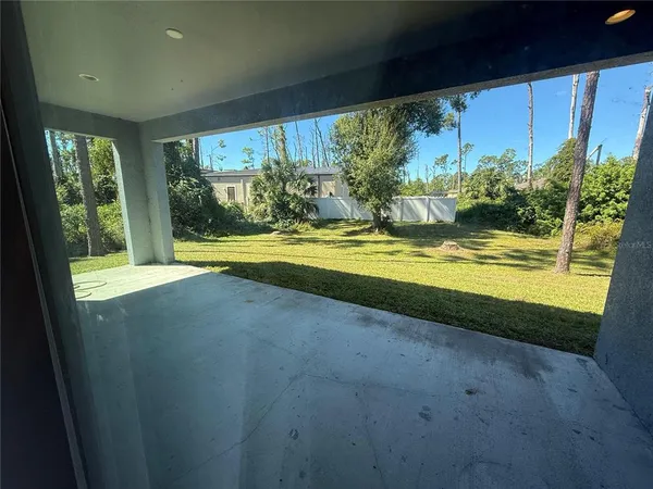 a view of a room with an outdoor space