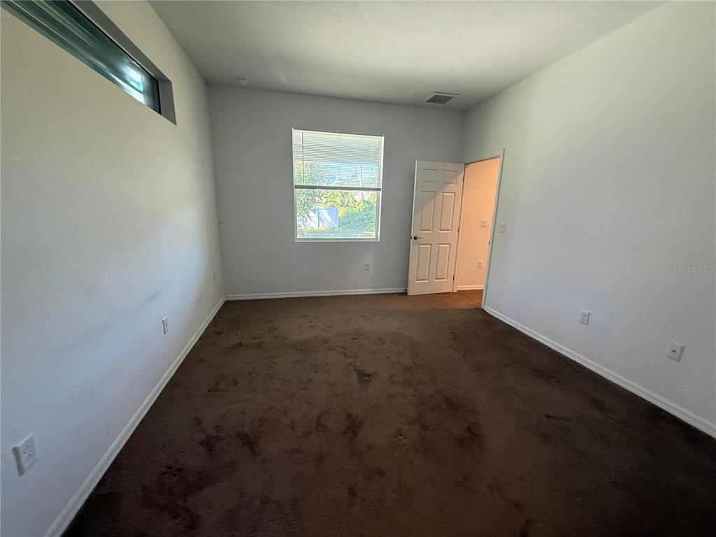 2143 Nabble Lane North Port, FL 34288 - Photo 10 of 17 an empty room with windows