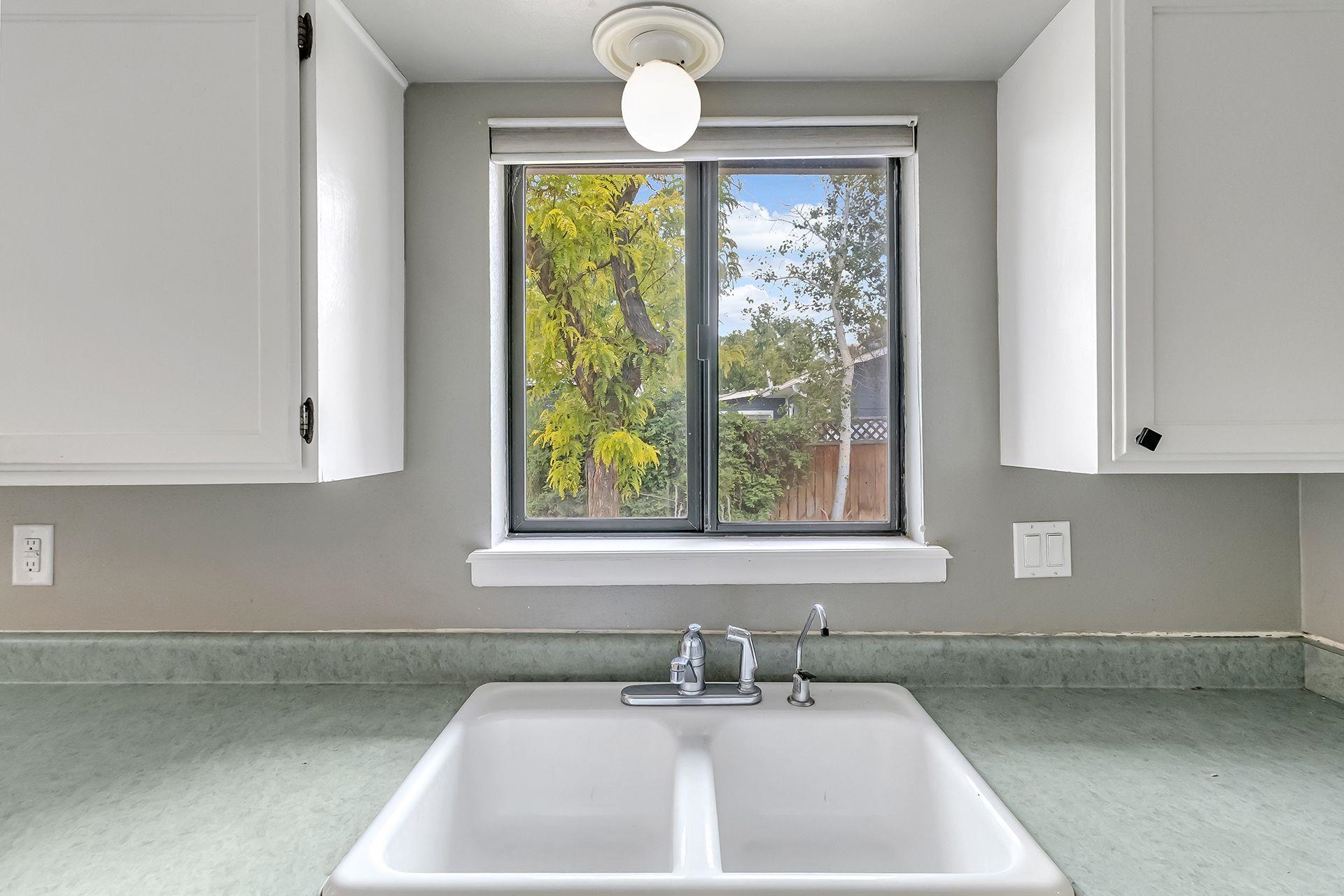 483-30 C 3/4 Road Grand Junction, CO 81504 - Photo 17 of 25 a bathroom with a sink and a window