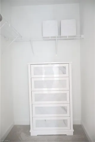 a view of an empty walk in closet