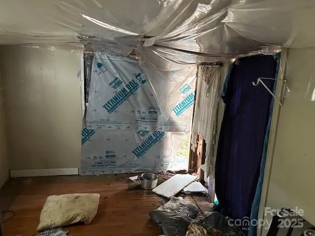 a bed room with a bed and a window