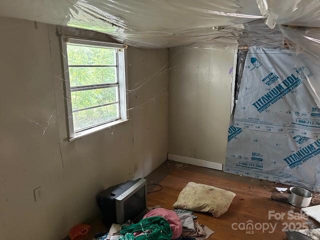 513 Boss Moore Road Ellenboro, NC 28040 - Photo 5 of 9 a bed room with a bed and a window