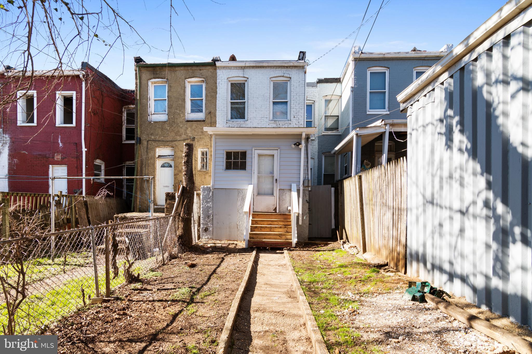 941 Brunswick Street Baltimore, MD 21223 - Photo 28 of 35 a front view of a house with a yard