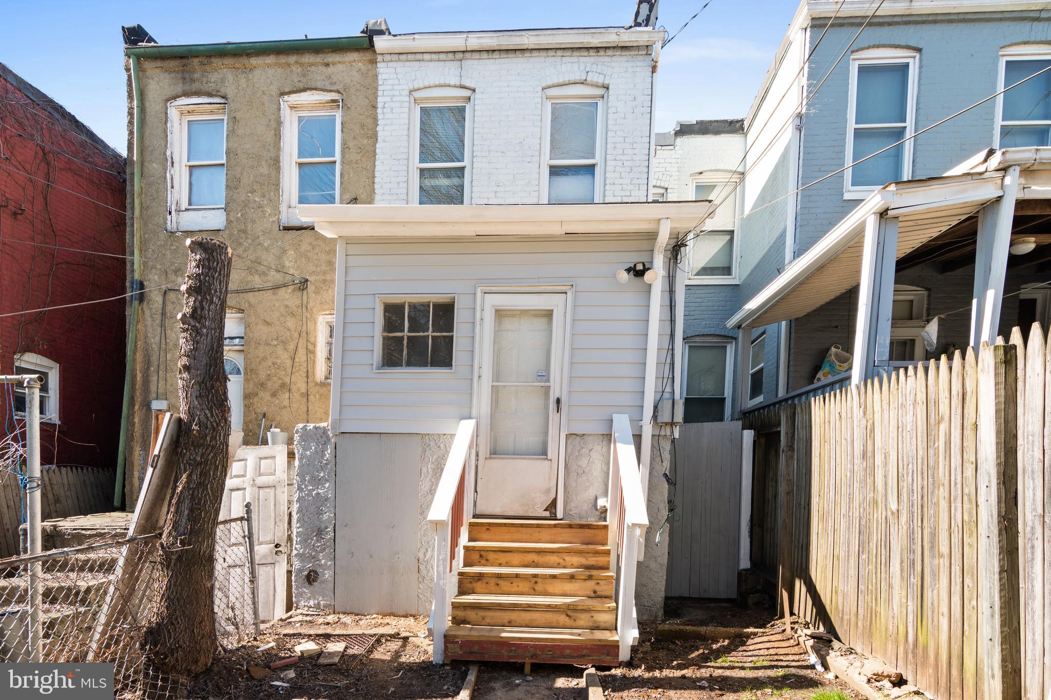 941 Brunswick Street Baltimore, MD 21223 - Photo 29 of 35 a front view of a house with a yard
