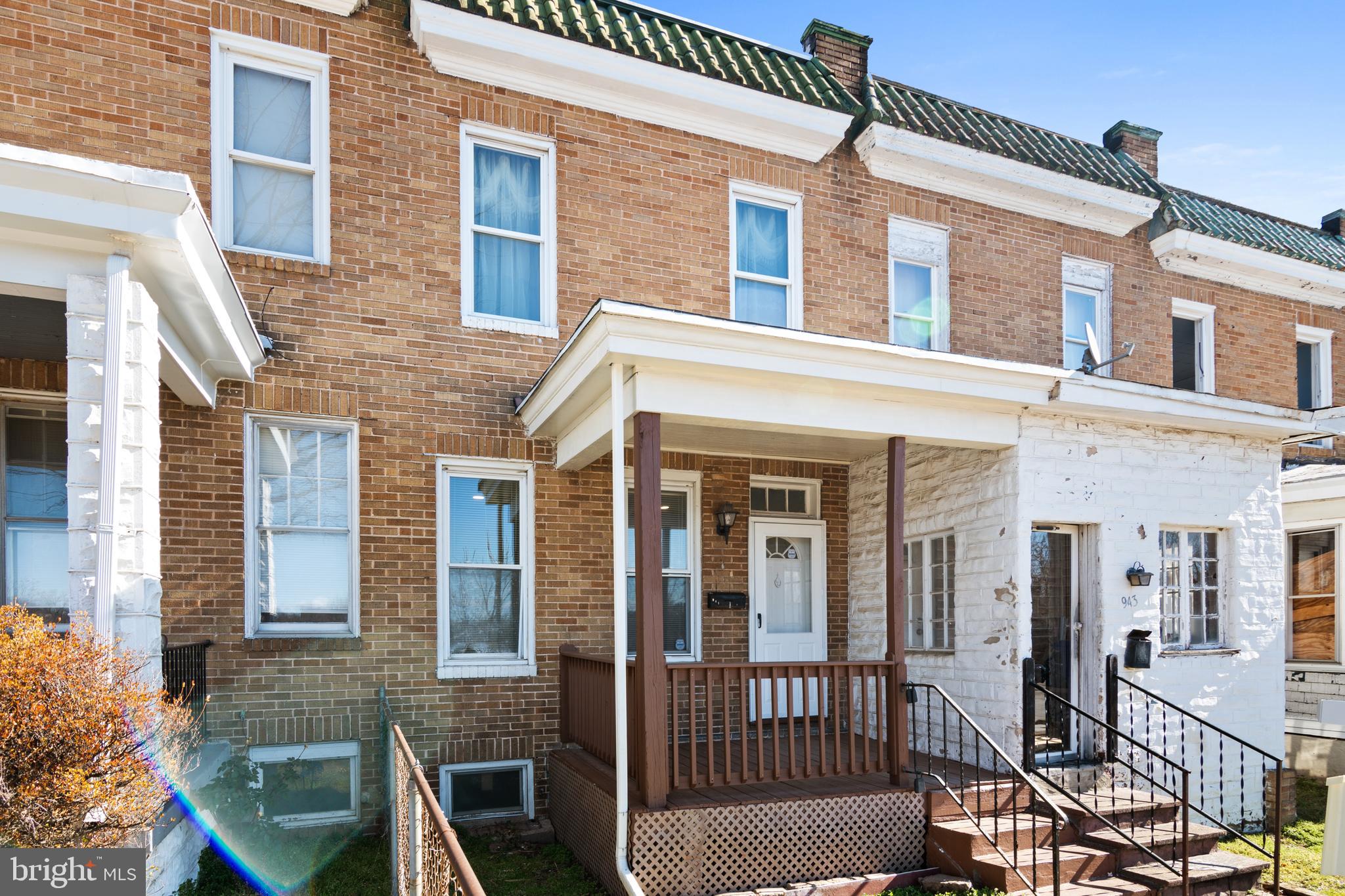 941 Brunswick Street Baltimore, MD 21223 - Photo 32 of 35 front view of a brick house with large windows