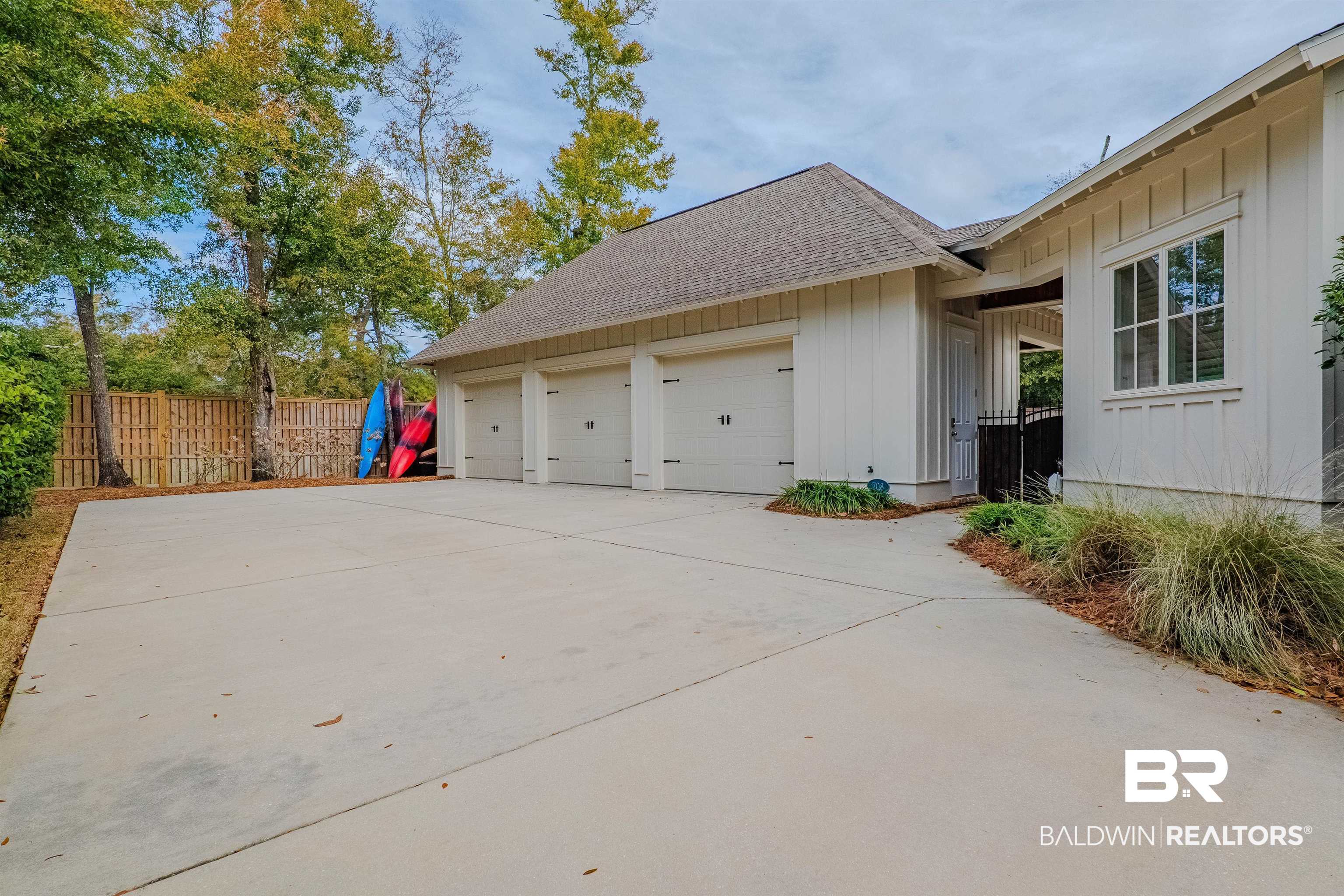 708 Manning Place Fairhope, AL 36532 - Photo 52 of 58 View of side of property with a garage