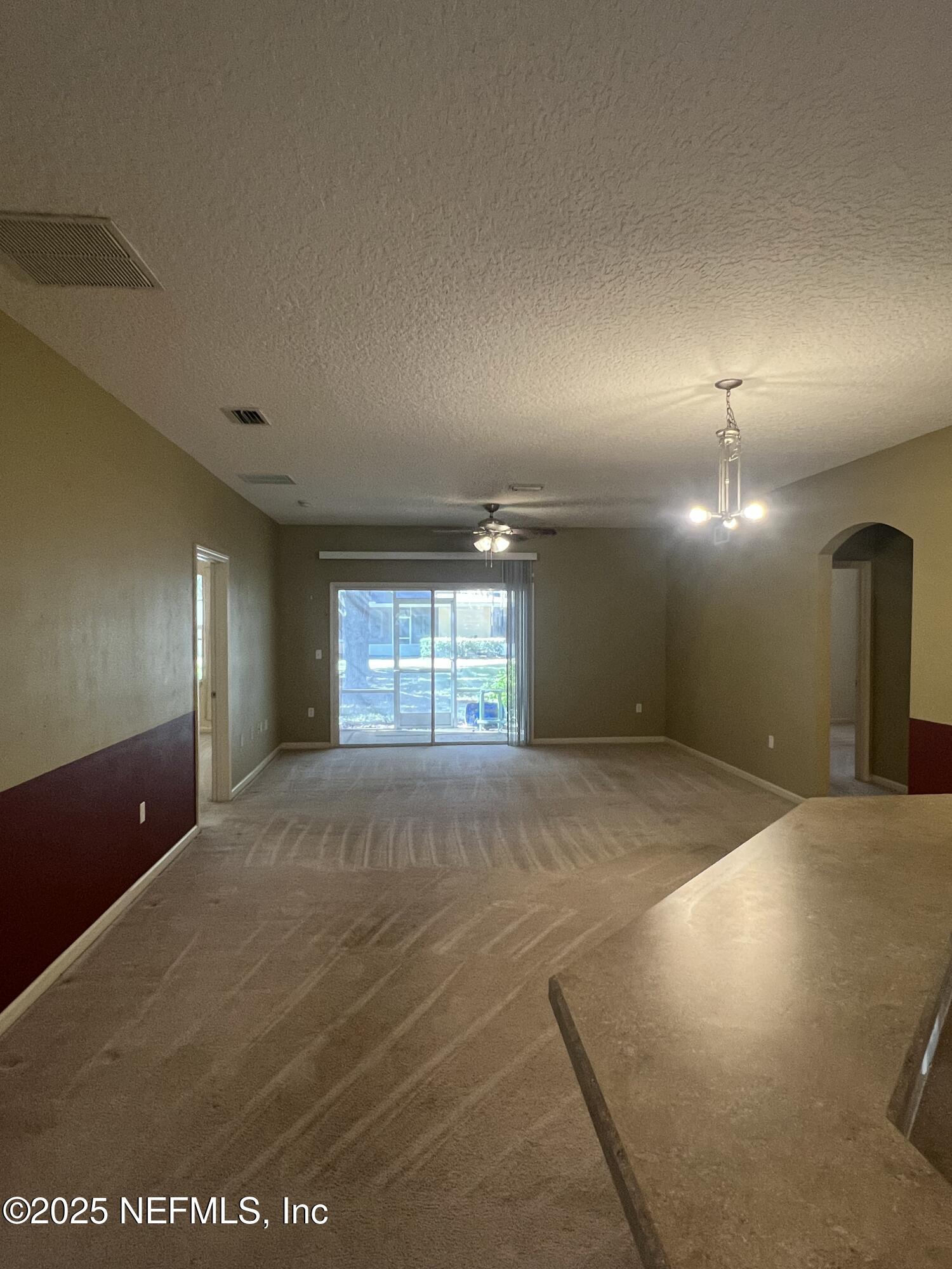 5663 Greenland Road, Unit 1706 Jacksonville, FL 32258 - Photo 3 of 11 a view of large hall with a window