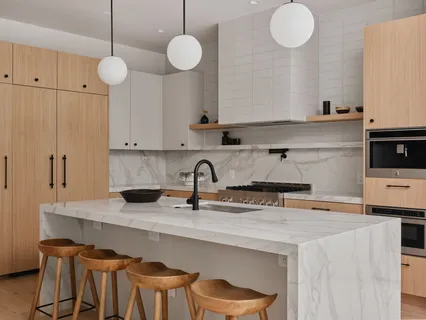 a kitchen with stainless steel appliances granite countertop a sink a stove and a wooden cabinets