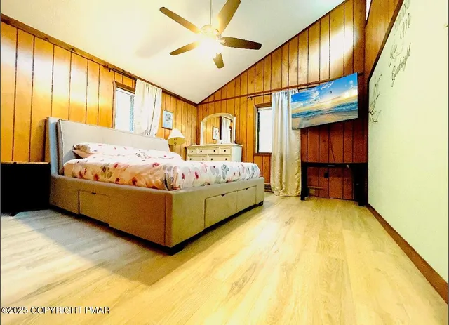 a view of a swimming pool with a yard