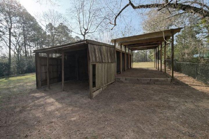 23319 Peninsula Point Frankston, TX 75763 - Photo 20 of 28 Back of RV storage/storage buildings
