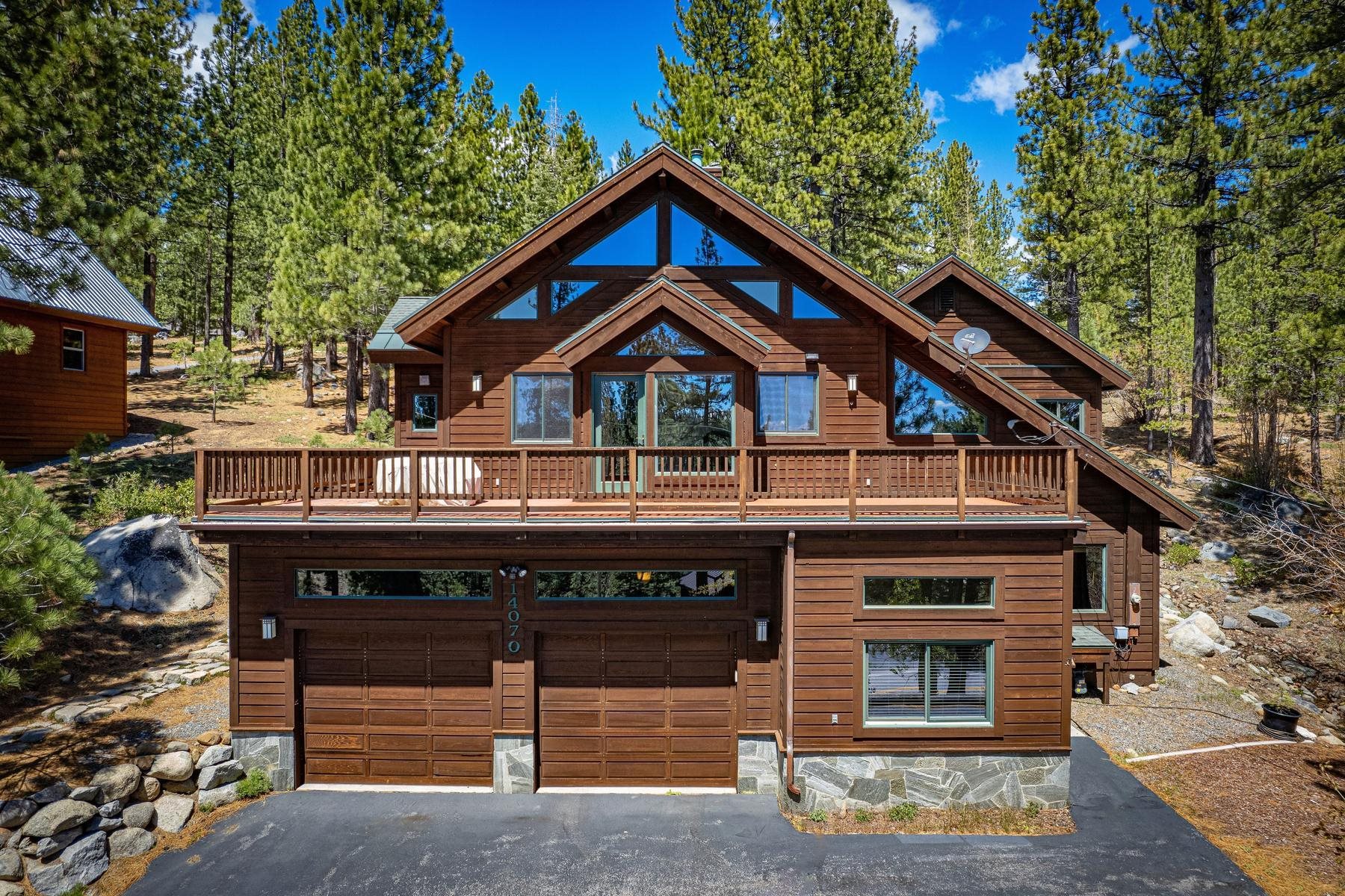 14070 Alder Creek Road Truckee, CA 96161 - Photo 1 of 28 a front view of a house with a yard