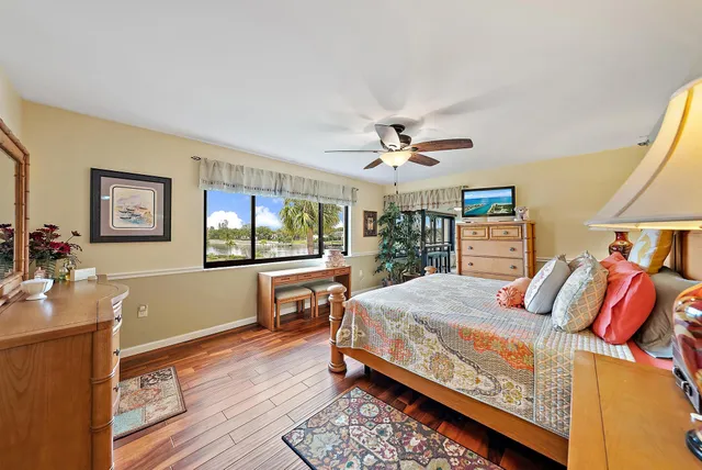 a bedroom with a bed and a table