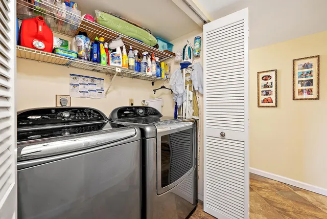 a utility room with dryer and washer