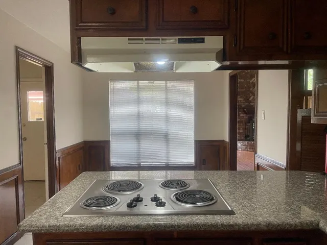 a view of a refrigerator in the kitchen
