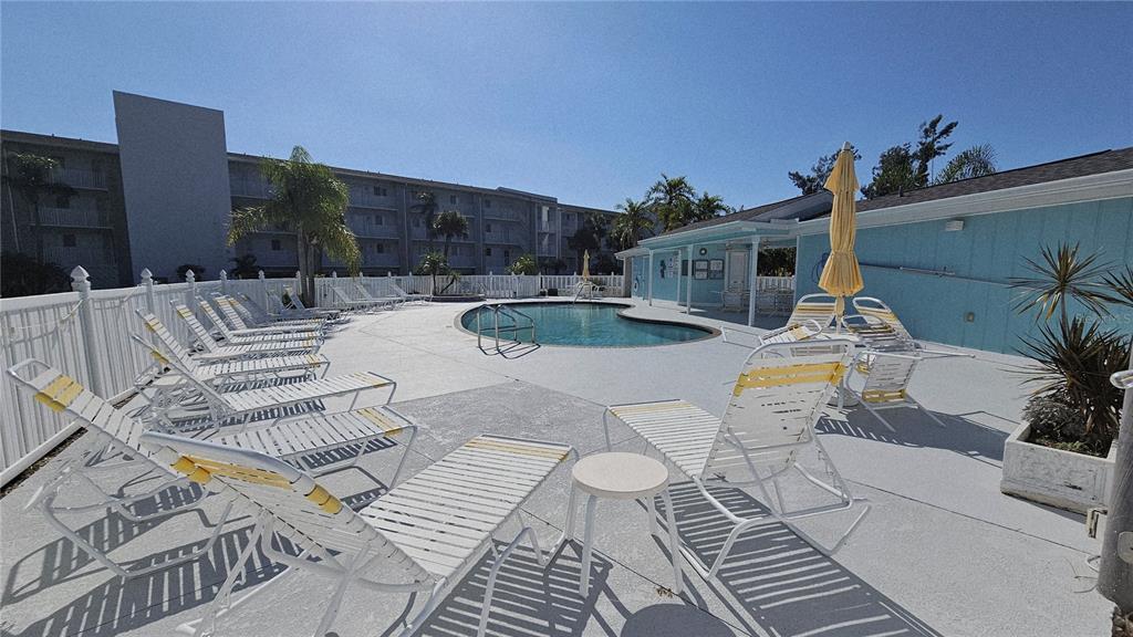 1401 South McCall Road, Unit 301A Englewood, FL 34223 - Photo 19 of 22 a view of outdoor kitchen outdoor seating