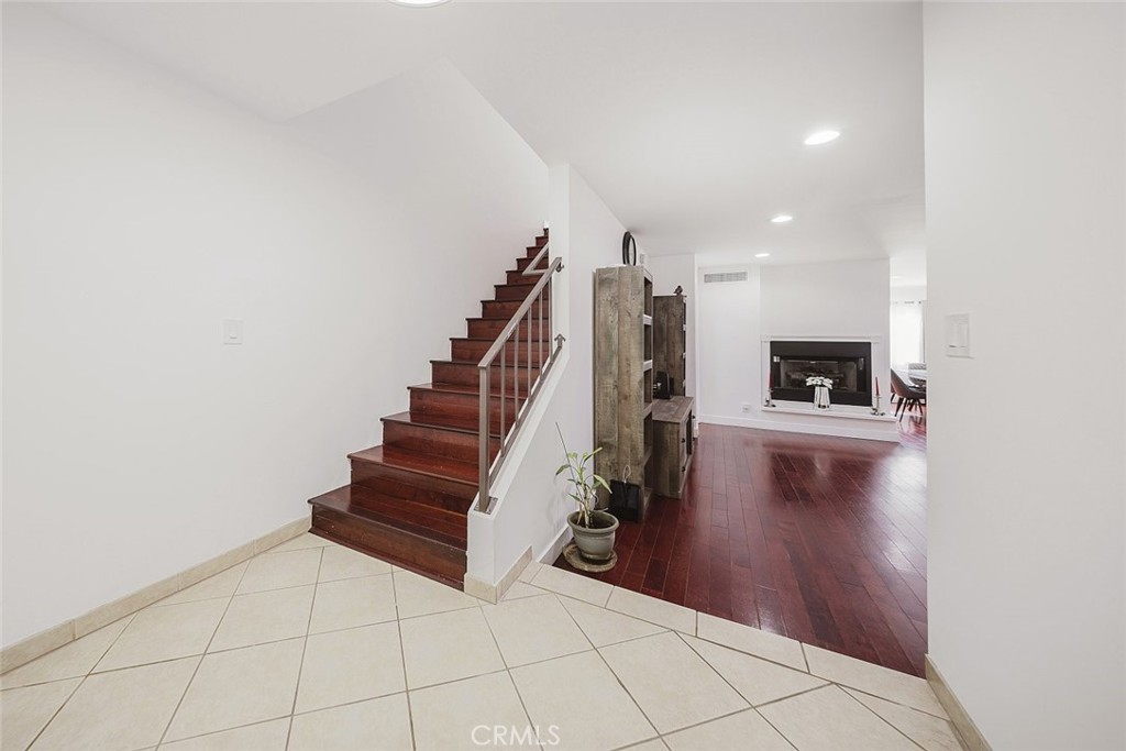 9775 Vía Roma Burbank, CA 91504 - Photo 20 of 39 a view of entryway and hall with wooden floor