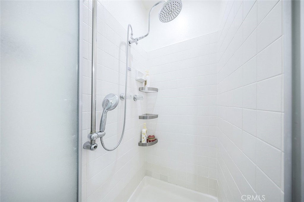 9775 Vía Roma Burbank, CA 91504 - Photo 26 of 39 a bathroom with a shower