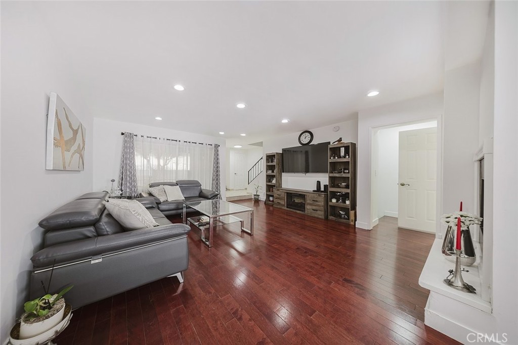 9775 Vía Roma Burbank, CA 91504 - Photo 5 of 39 a living room with furniture and wooden floor