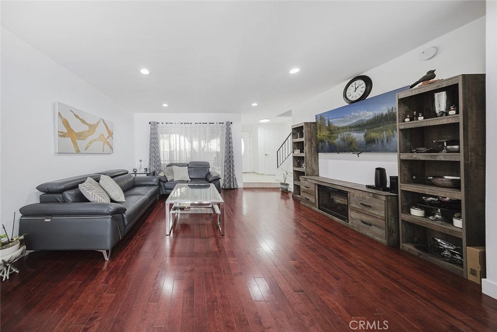 9775 Vía Roma Burbank, CA 91504 - Photo 6 of 39 a living room with furniture and wooden floor