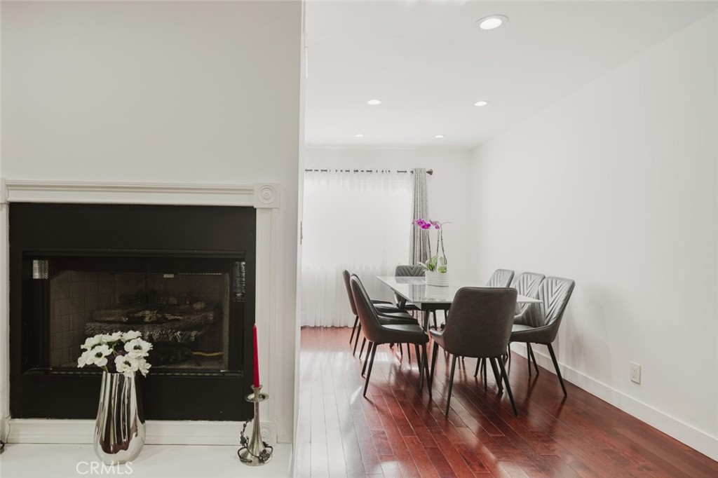 9775 Vía Roma Burbank, CA 91504 - Photo 10 of 39 a view of a dining room with furniture and wooden floor