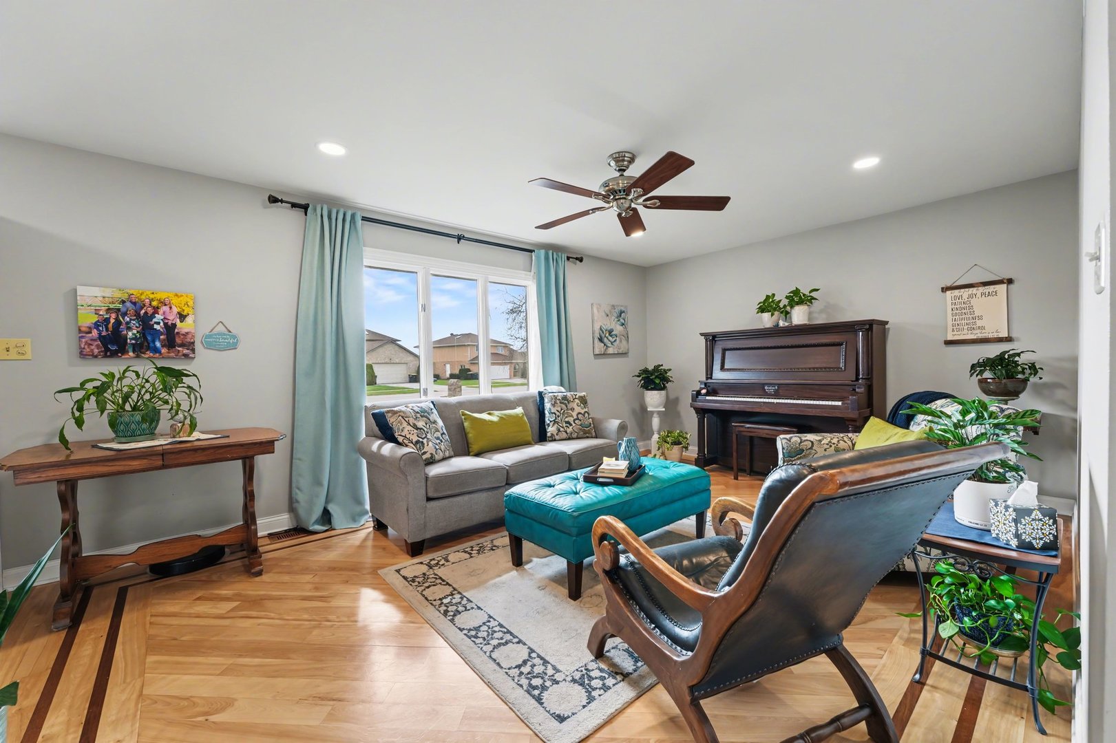 3604 192nd Street Lansing, IL 60438 - Photo 5 of 29 a living room with furniture a rug and a piano