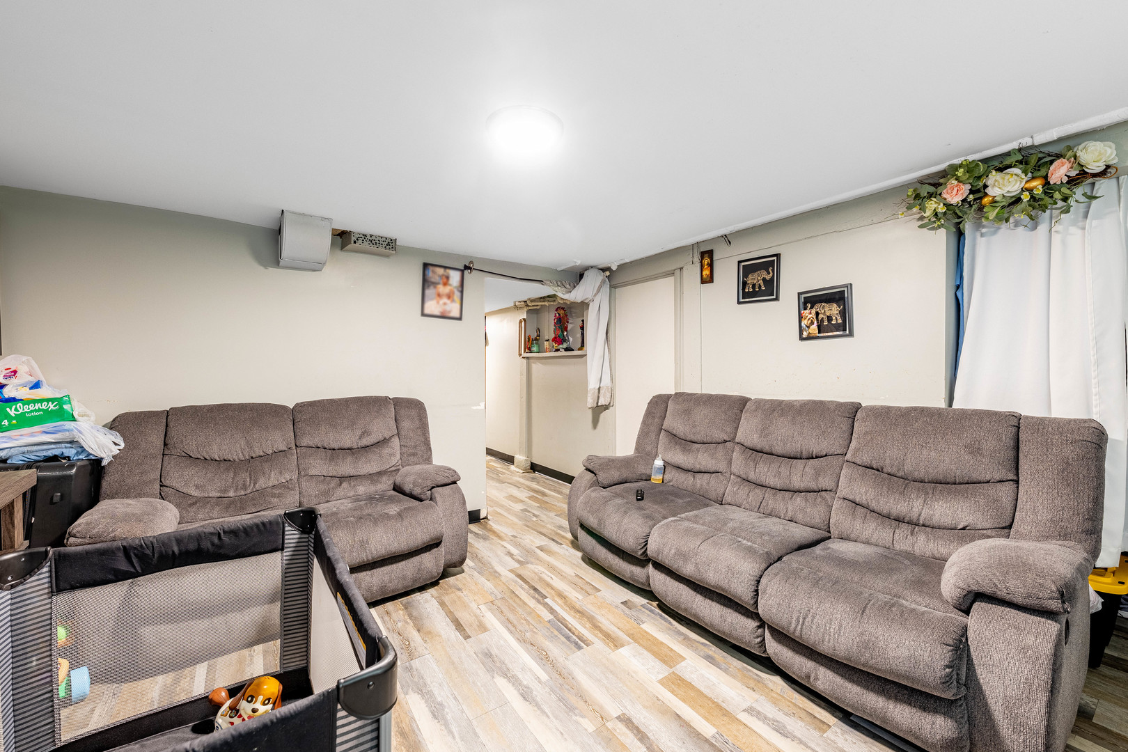 2434 South Harding Avenue Chicago, IL 60623 - Photo 14 of 21 a living room with furniture and a couch
