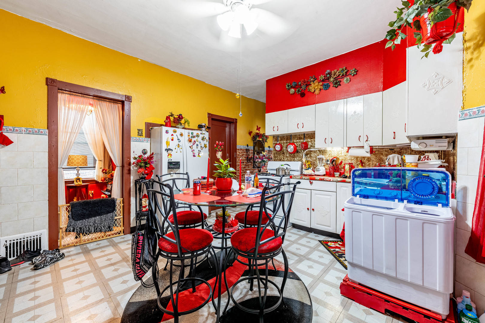 2434 South Harding Avenue Chicago, IL 60623 - Photo 3 of 21 a group of people sitting in a living room