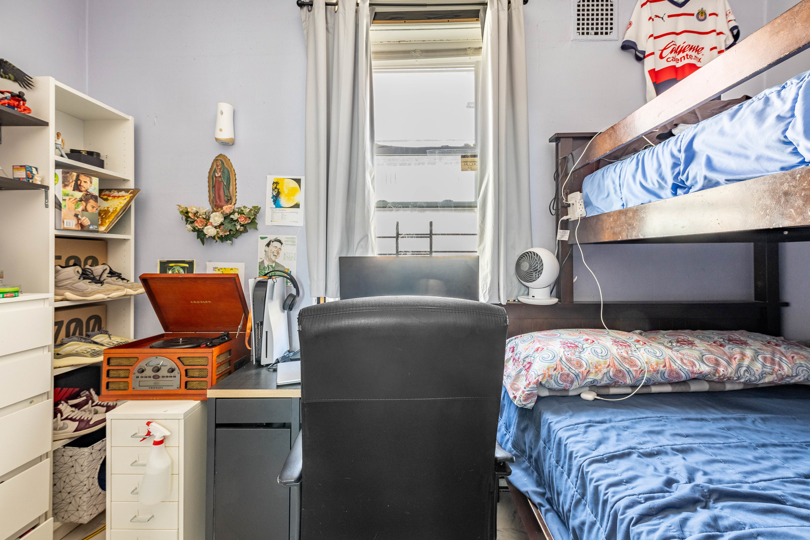 2434 South Harding Avenue Chicago, IL 60623 - Photo 9 of 21 a bedroom with bed and a window