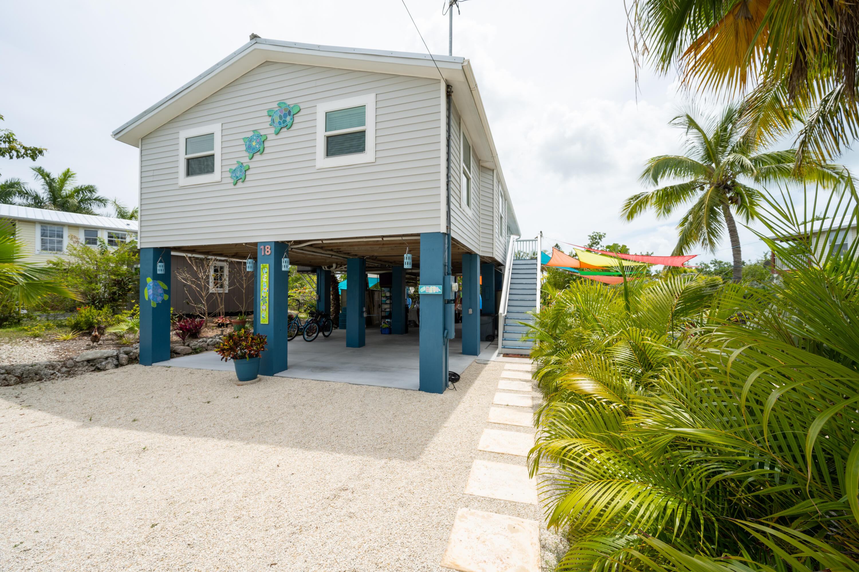 18 West Circle Drive Key West, FL 33040 - Photo 1 of 30 a view of a house with a patio