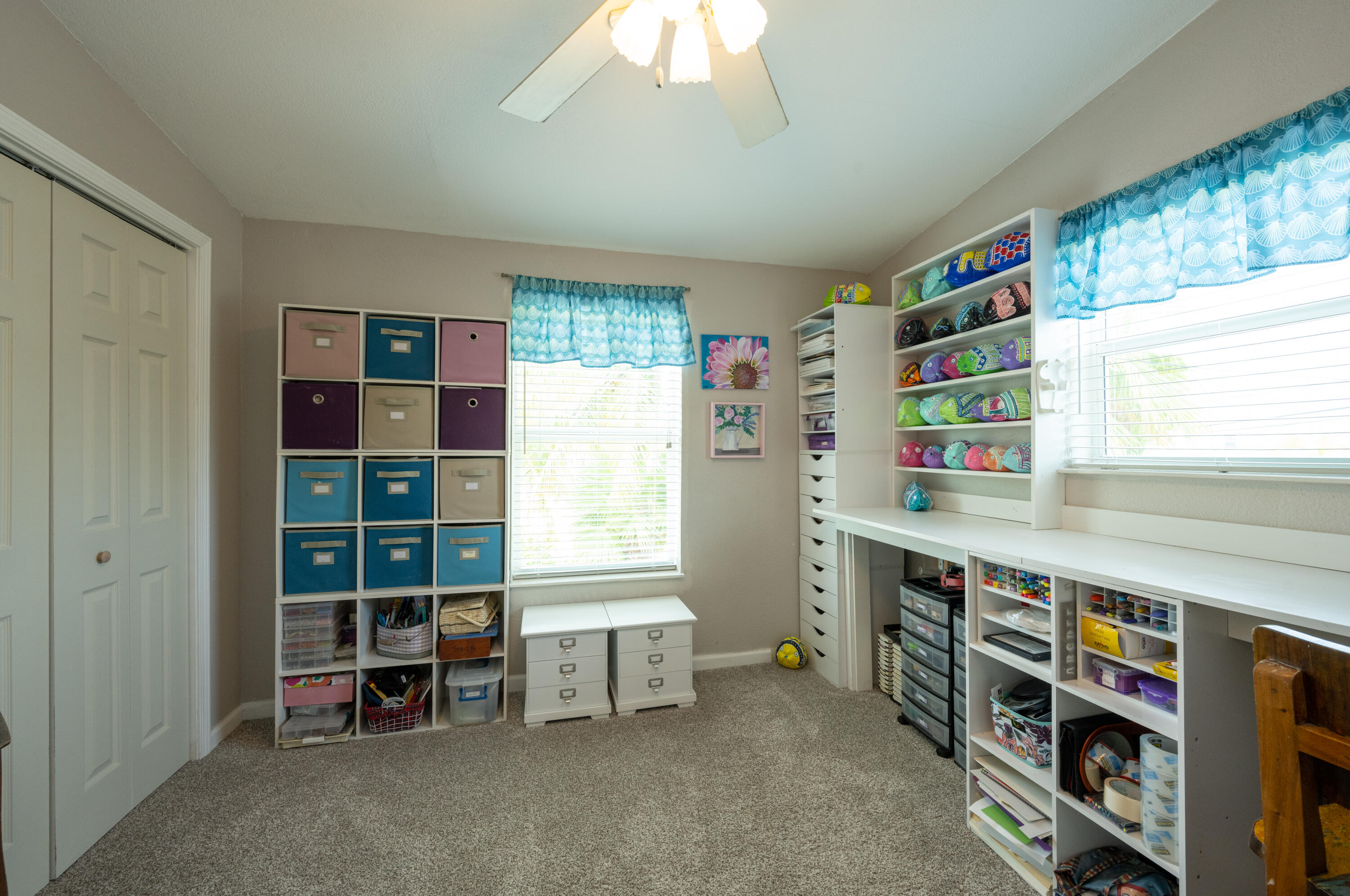 18 West Circle Drive Key West, FL 33040 - Photo 18 of 30 a room with furniture a window and bookshelf