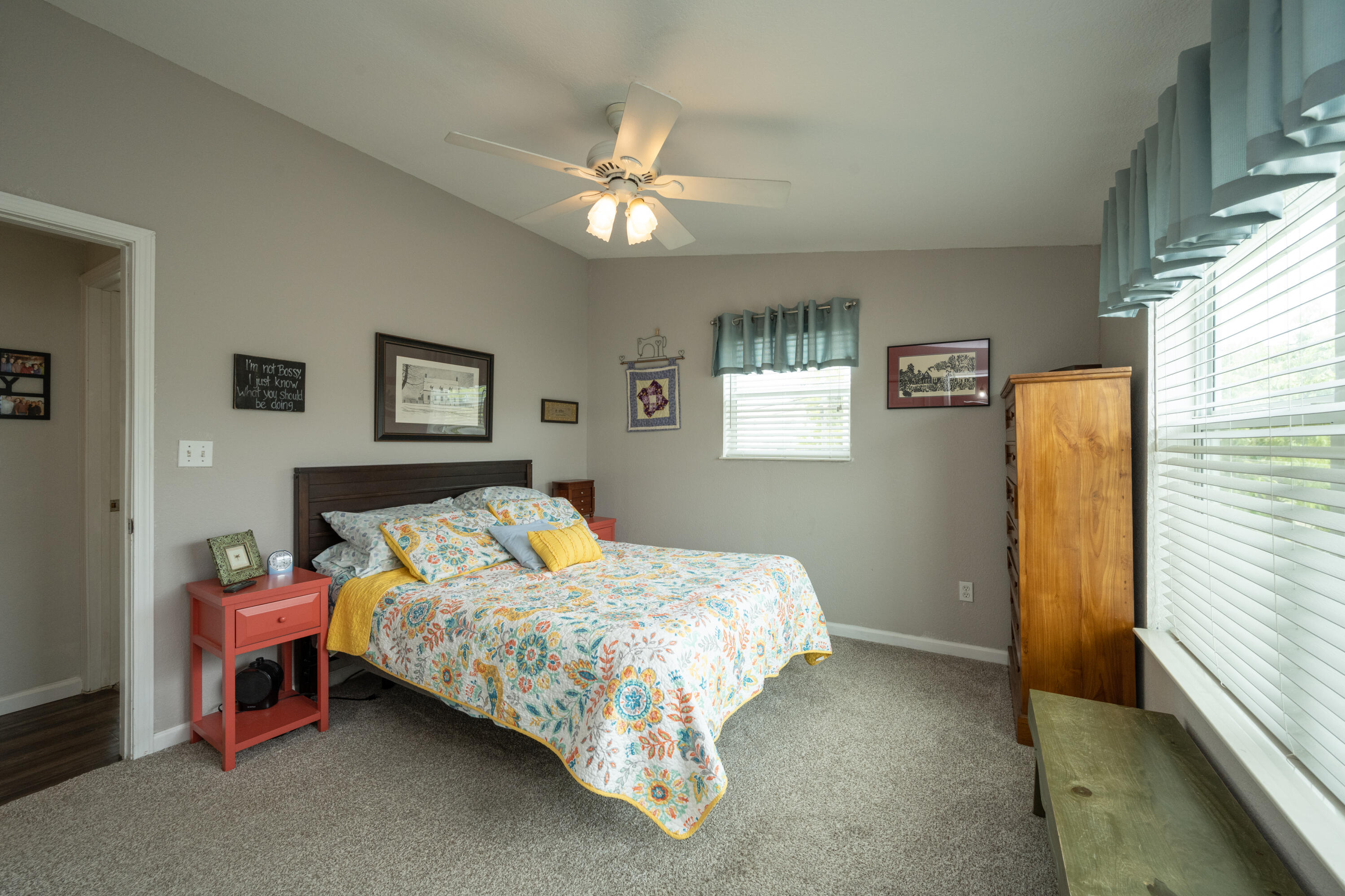 18 West Circle Drive Key West, FL 33040 - Photo 19 of 30 a bedroom with a bed and a chandelier
