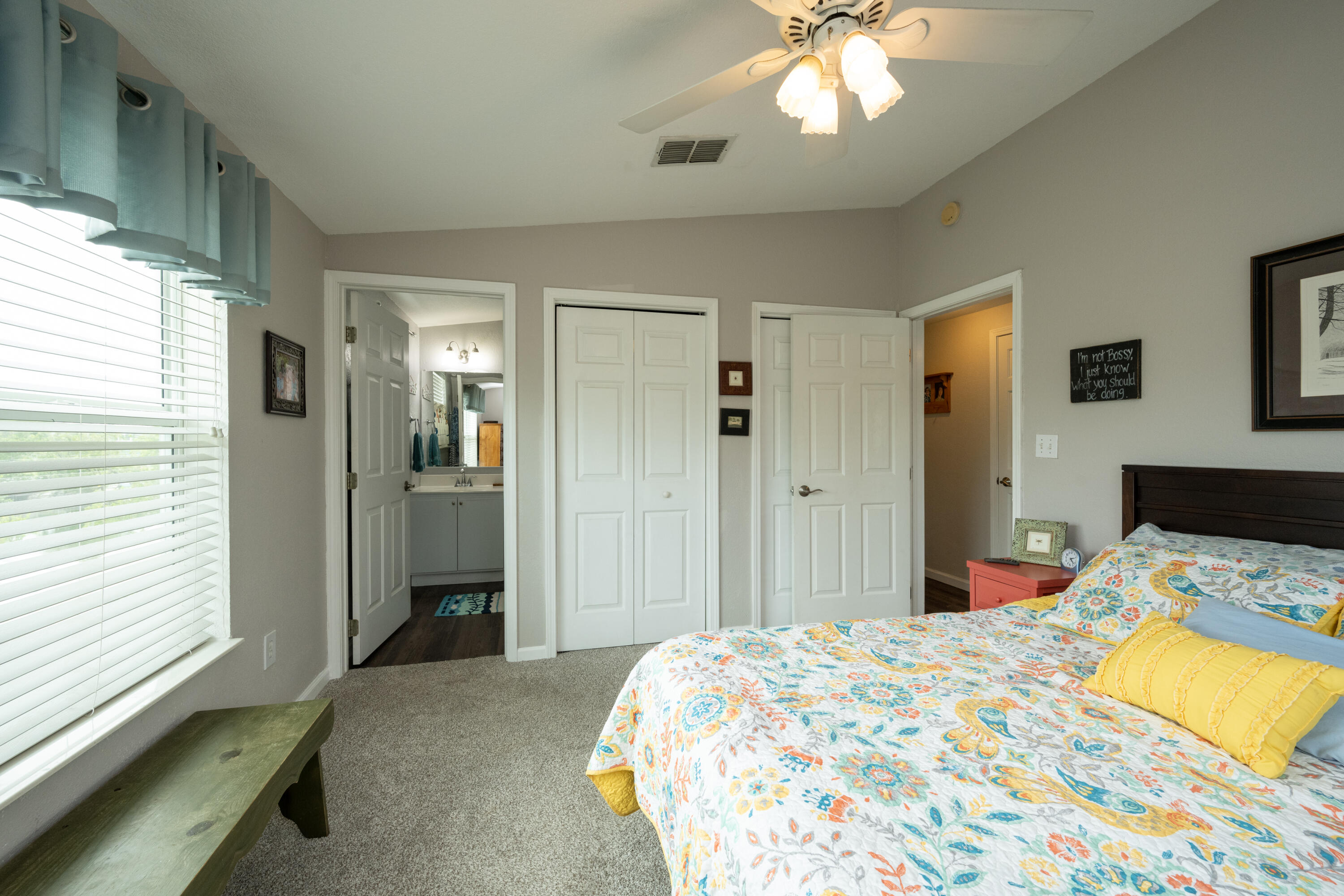 18 West Circle Drive Key West, FL 33040 - Photo 20 of 30 a bedroom with a bed and a chandelier